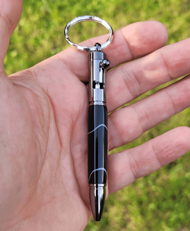Porte clef stylo Colt en résine noire