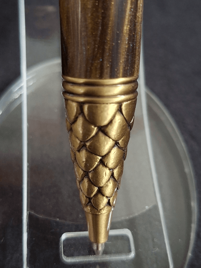 Stylo dragon bronze en résine cola