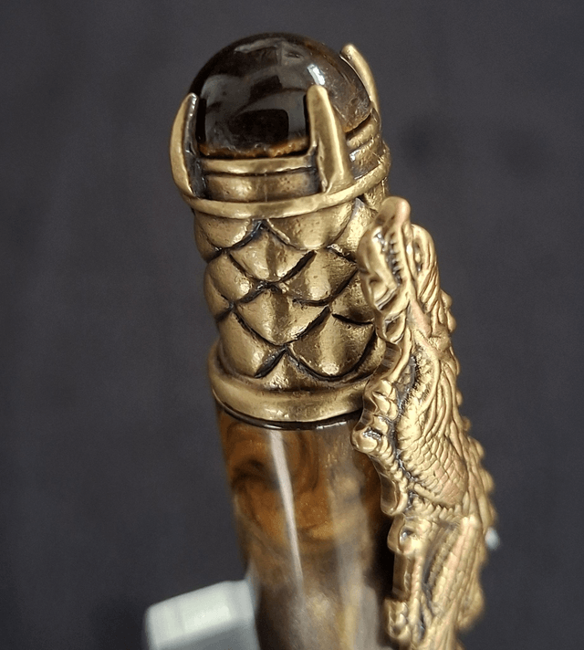 Stylo dragon bronze en résine cola