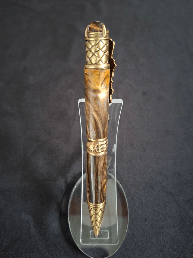 Stylo dragon bronze en résine cola