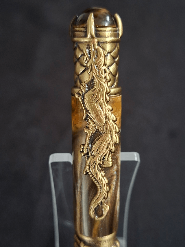 Stylo dragon bronze en résine cola