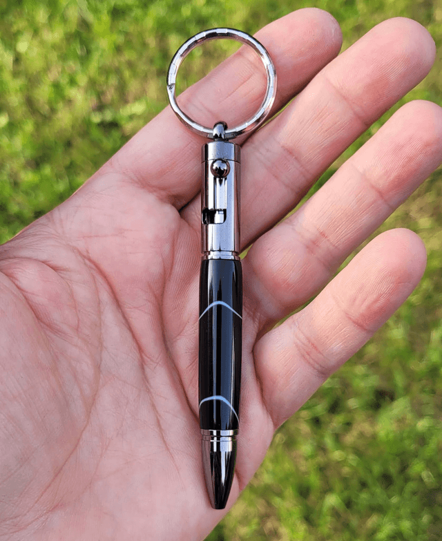 Porte clef stylo Colt en résine noire